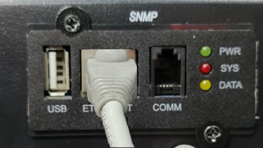SNMP card fitted with network cable connected and PWR, SYS and DATA lights